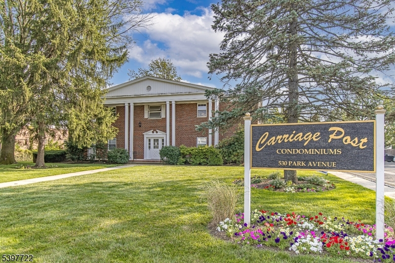 530 Park Avenue, Unit 214 Scotch Plains, NJ 07076 - Photo 2 of 17 a view of a house with a yard