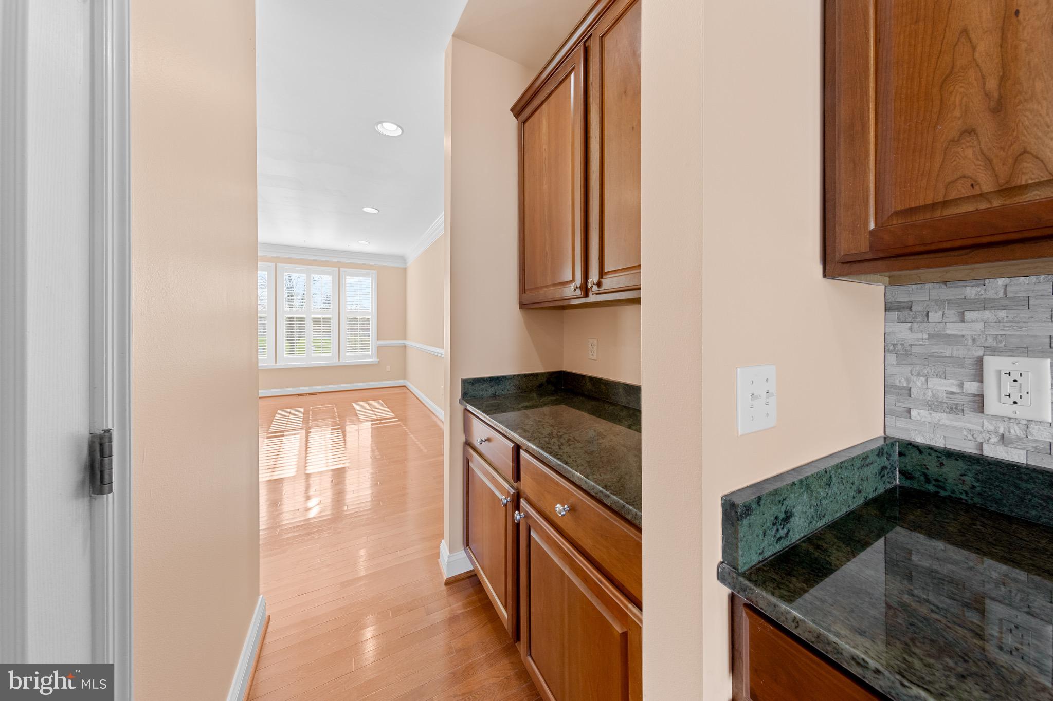 31436 Waters Way Lewes, DE 19958 - Photo 17 of 70 Butlers pantry/walk through kitchen to dining room