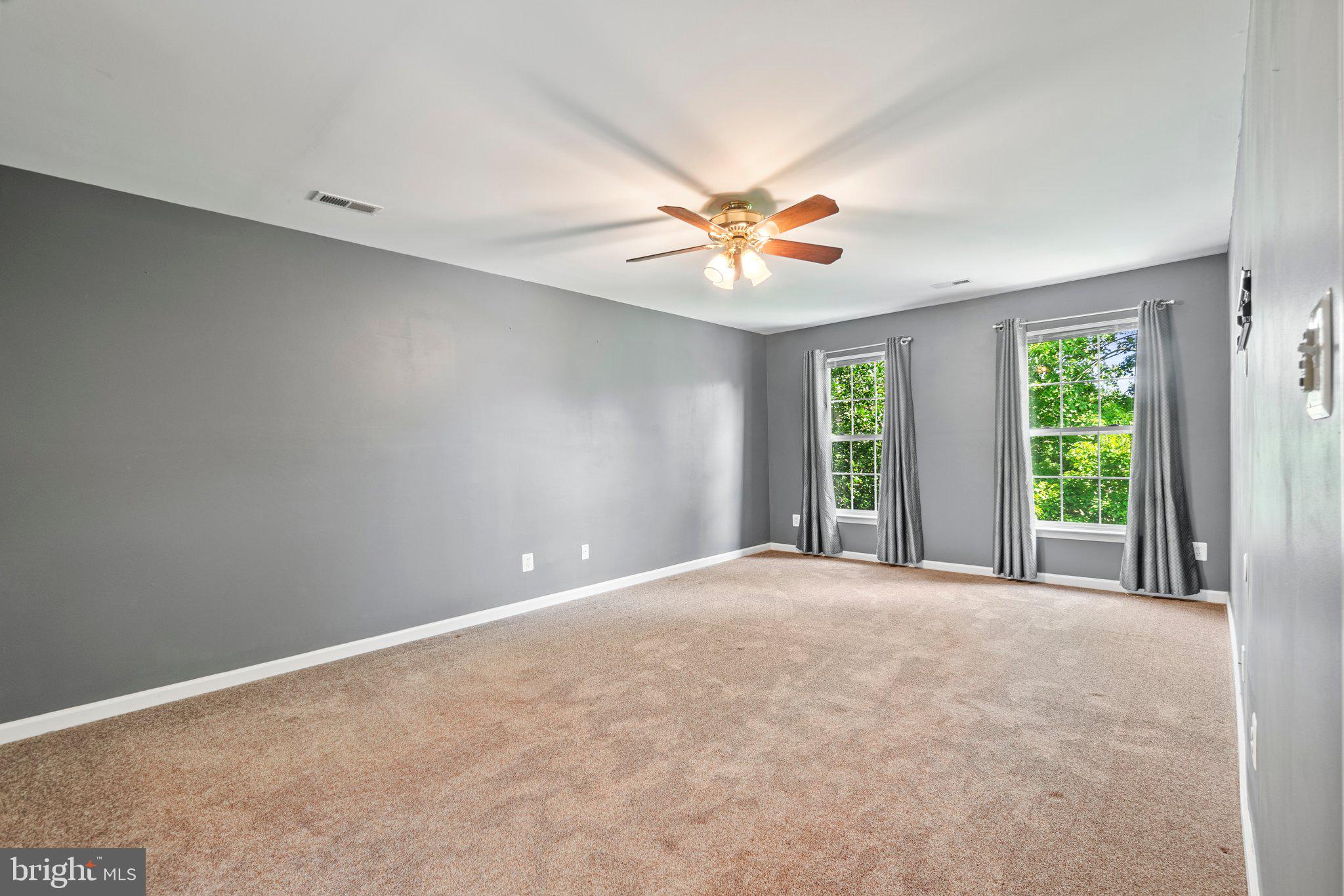 21255 Olive Green Court Ashburn, VA 20147 - Photo 15 of 32 a view of an empty room with a window