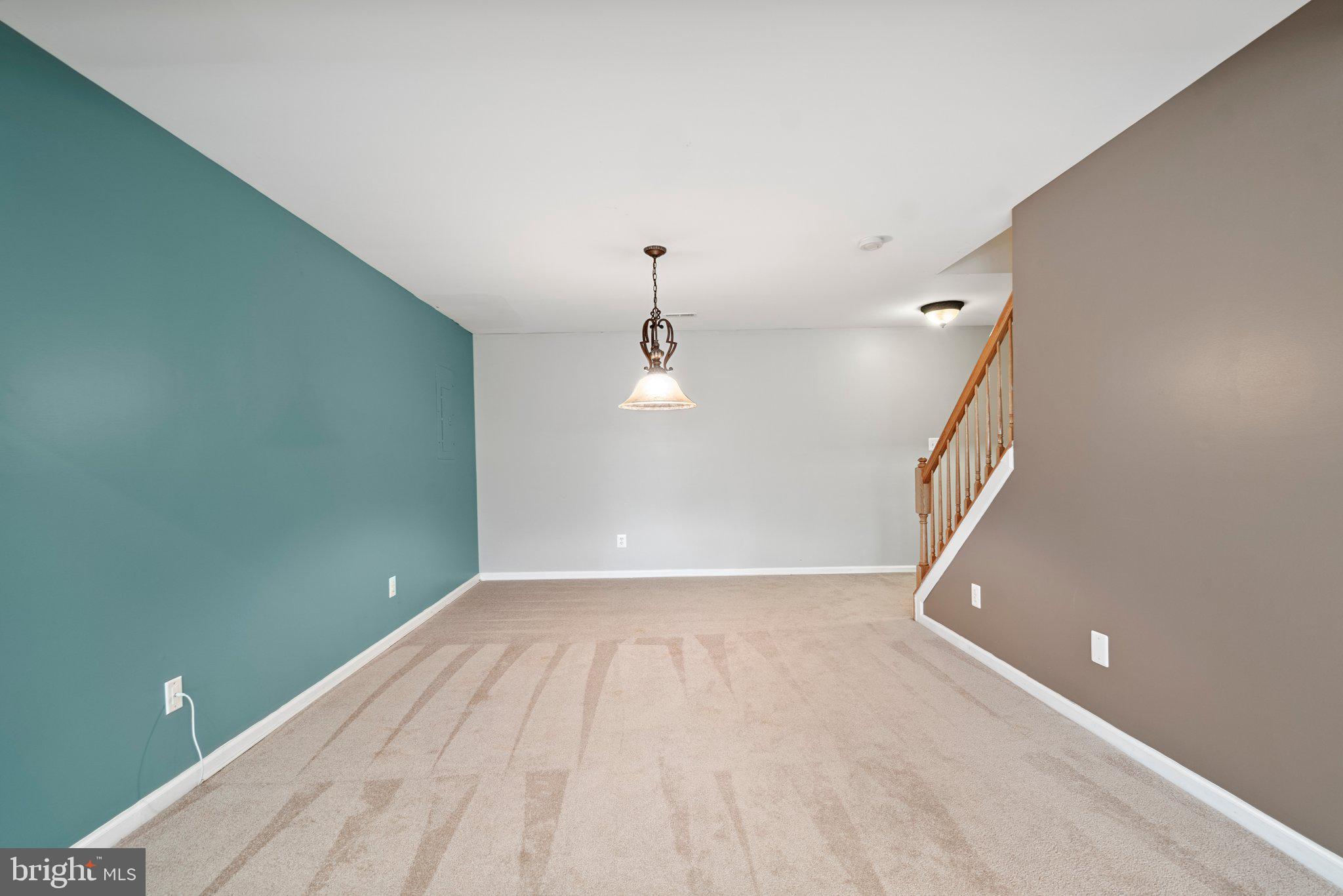 21255 Olive Green Court Ashburn, VA 20147 - Photo 28 of 32 a view of a room with wooden floor and window