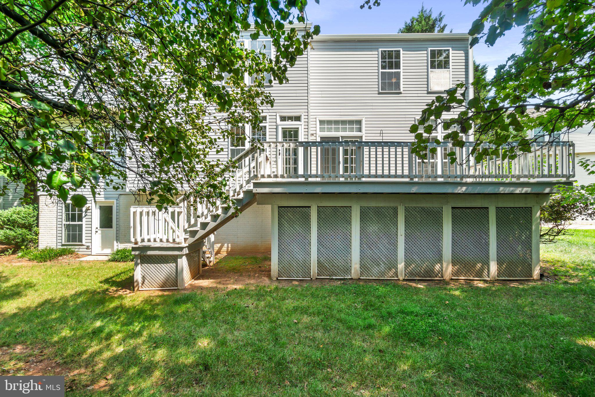 21255 Olive Green Court Ashburn, VA 20147 - Photo 32 of 32 a view of house with yard