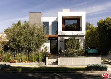 a view of a building with a street