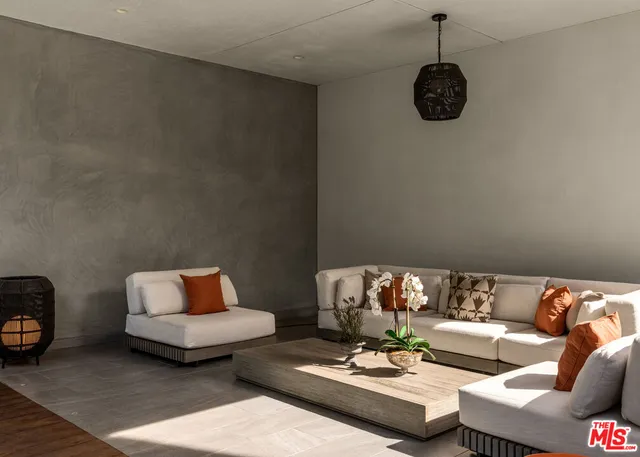 a living room with furniture and a couch