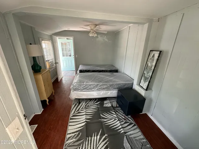 a view of entryway with wooden floor