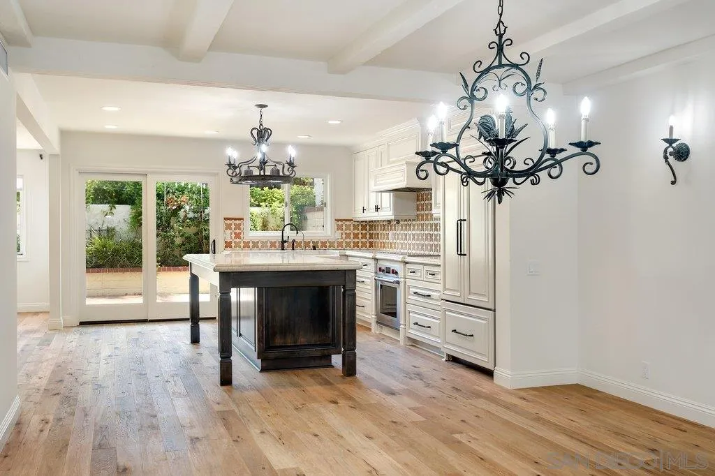 6125 La Flecha Rancho Santa Fe, CA 92067 - Photo 8 of 25 a view of a dining room kitchen and a chandelier