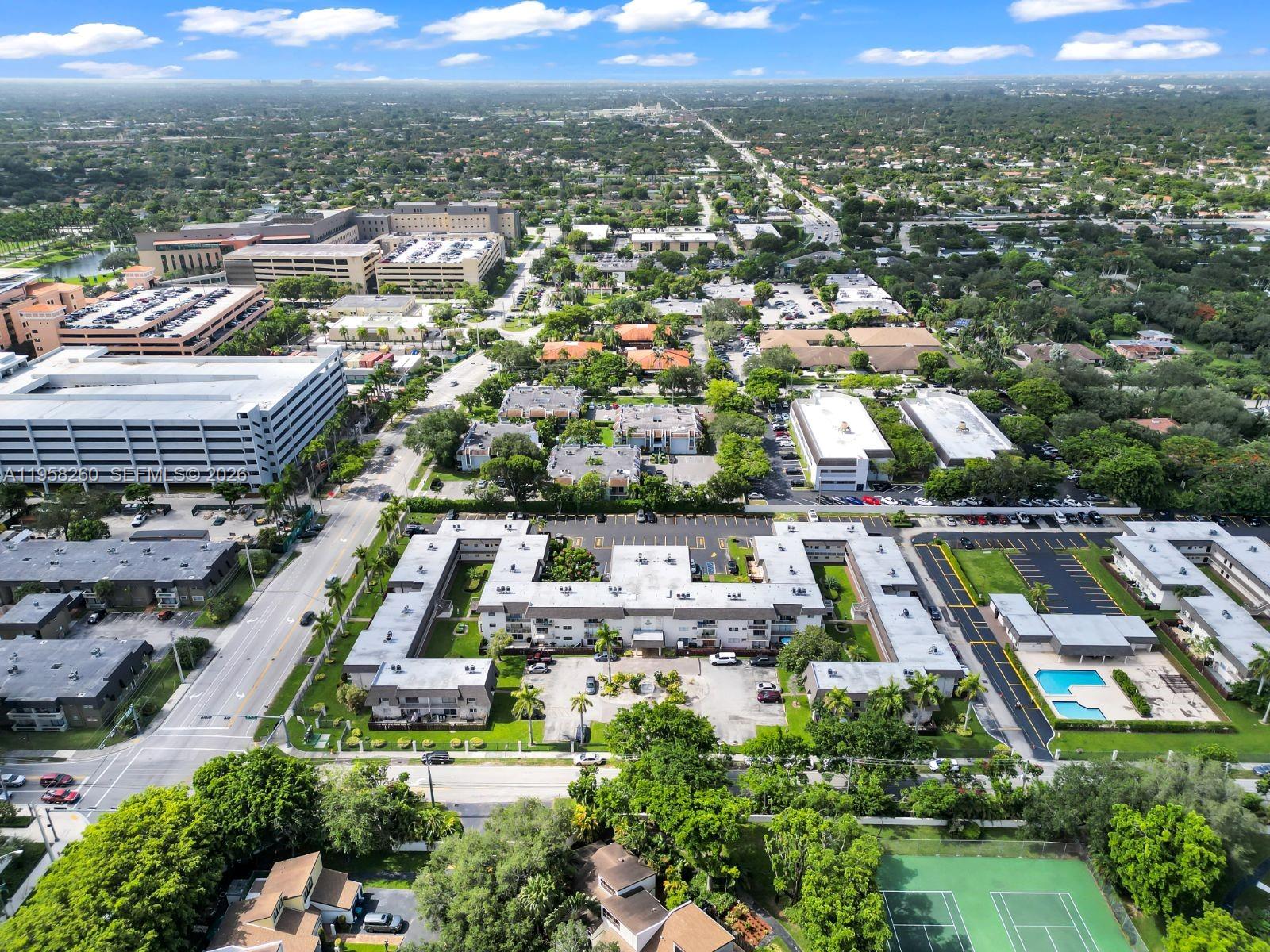8601 Southwest 94th Street, Unit 104W Miami, FL 33156 - Photo 27 of 29 an aerial view of residential houses with city view