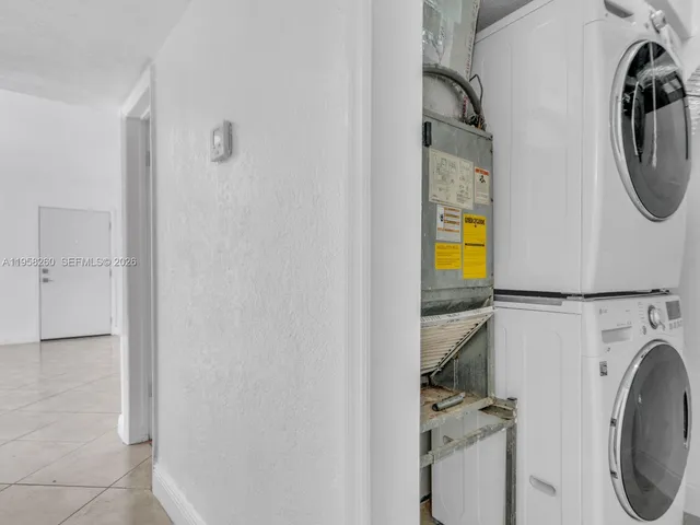 a view of a storage & utility room with washer and dryer