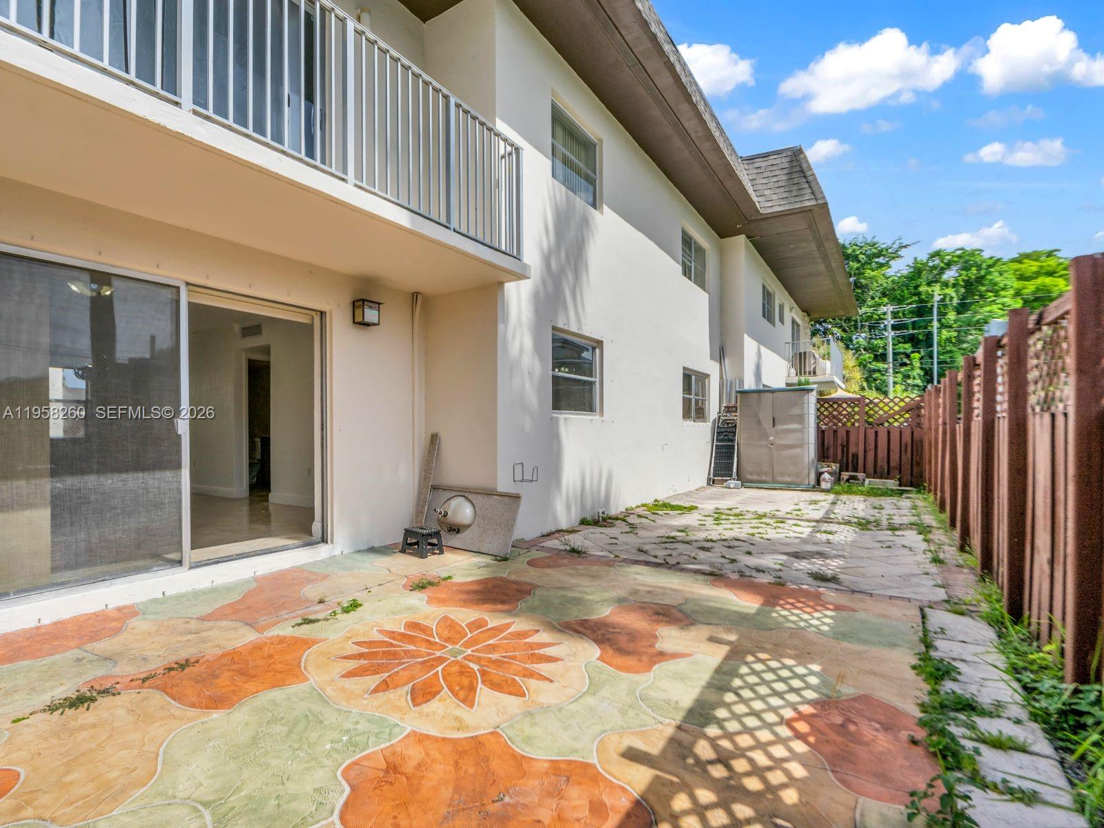 8601 Southwest 94th Street, Unit 104W Miami, FL 33156 - Photo 6 of 29 a view of a entrance door of the house