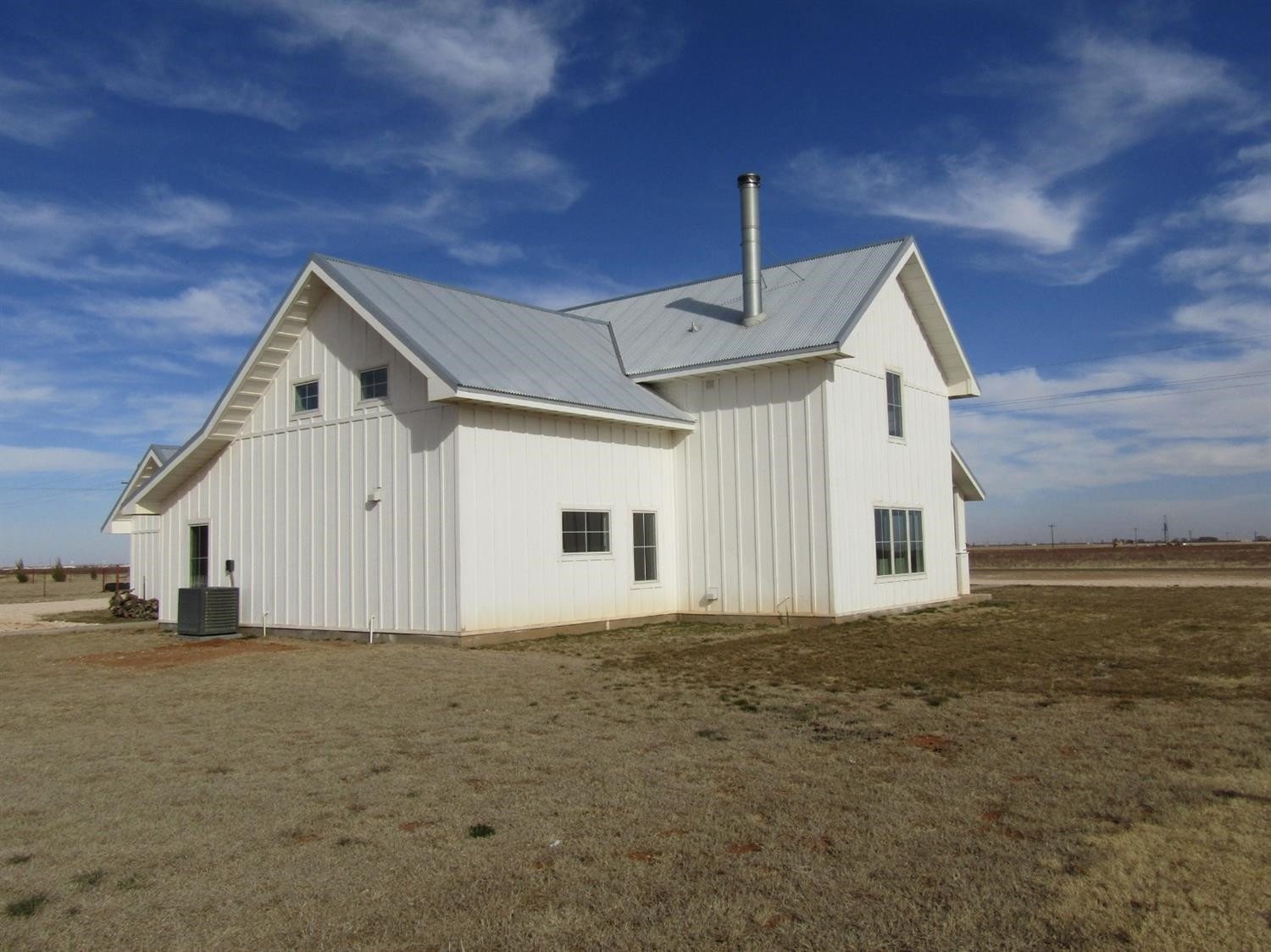 3370 Drill Stem Road Levelland, TX 79336 - Photo 29 of 38 a view of a house with backyard