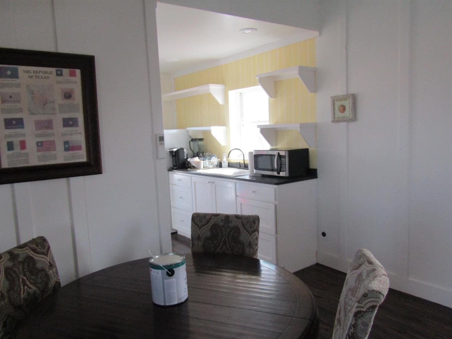 3370 Drill Stem Road Levelland, TX 79336 - Photo 33 of 38 a living room with furniture and a wooden floor