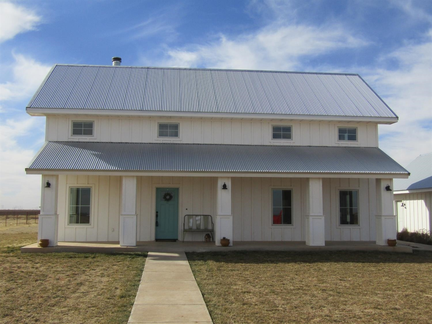 3370 Drill Stem Road Levelland, TX 79336 - Photo 38 of 38 a front view of a house with a yard