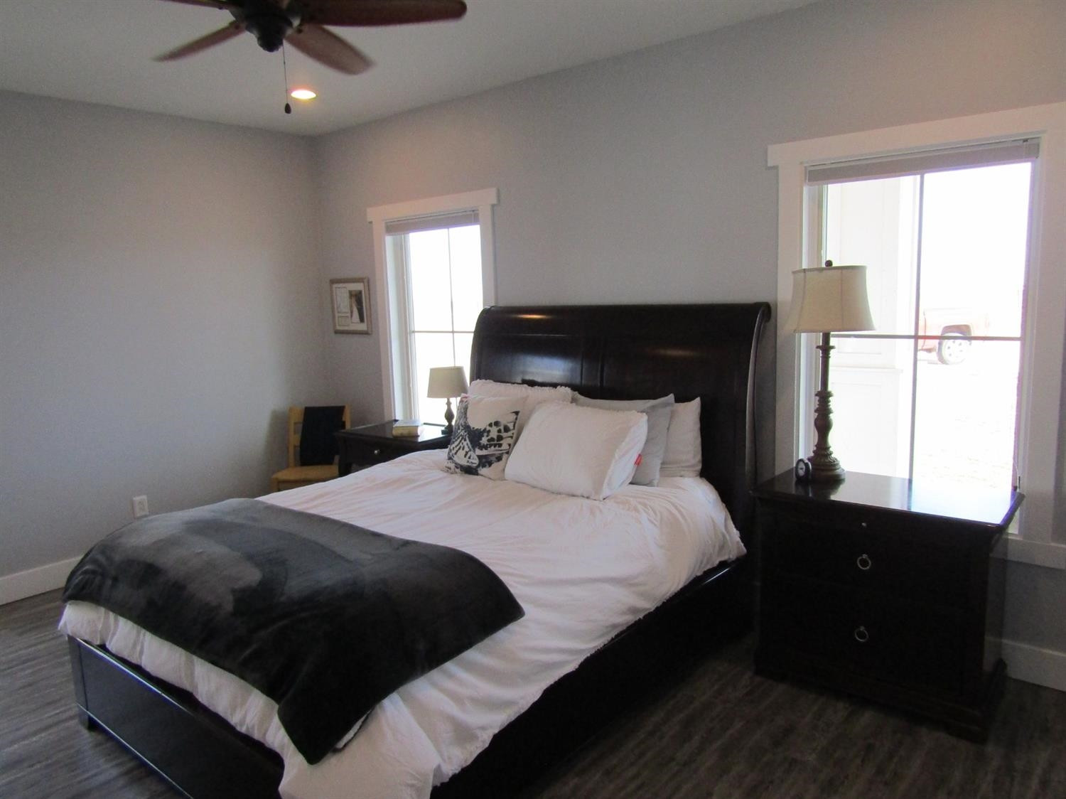3370 Drill Stem Road Levelland, TX 79336 - Photo 10 of 38 a bedroom with a bed and window