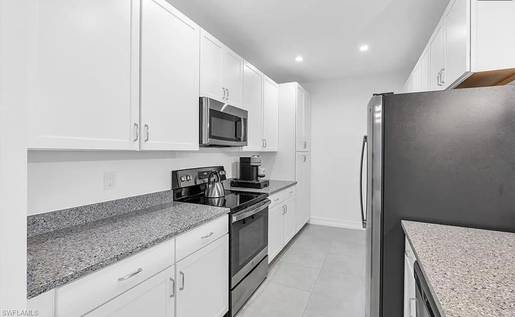7624 Morgan Way Naples, FL 34119 - Photo 11 of 35