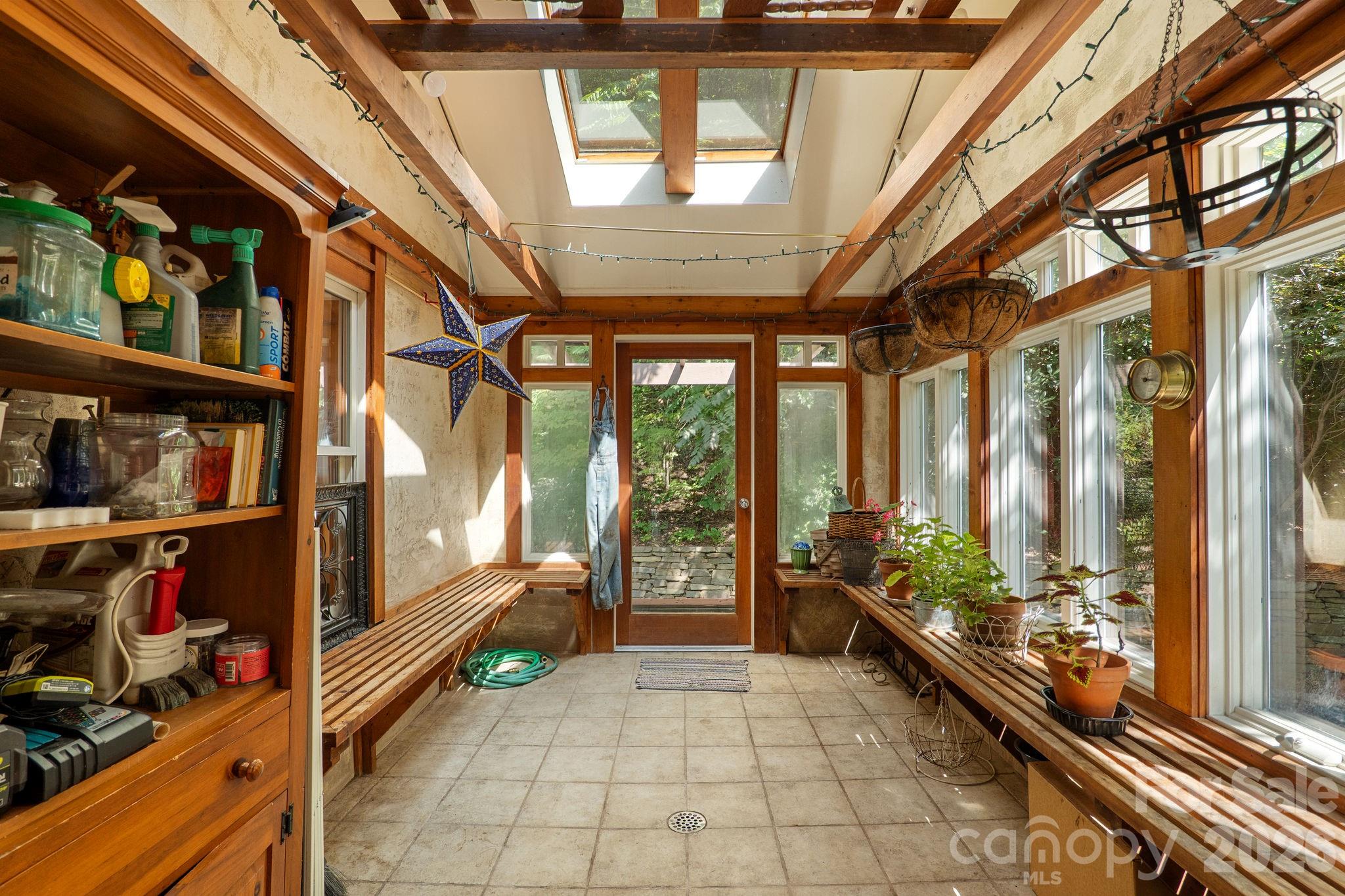 150 Avondale Ridge Road Asheville, NC 28803 - Photo 19 of 45 a view of an entryway with a lot of stuff