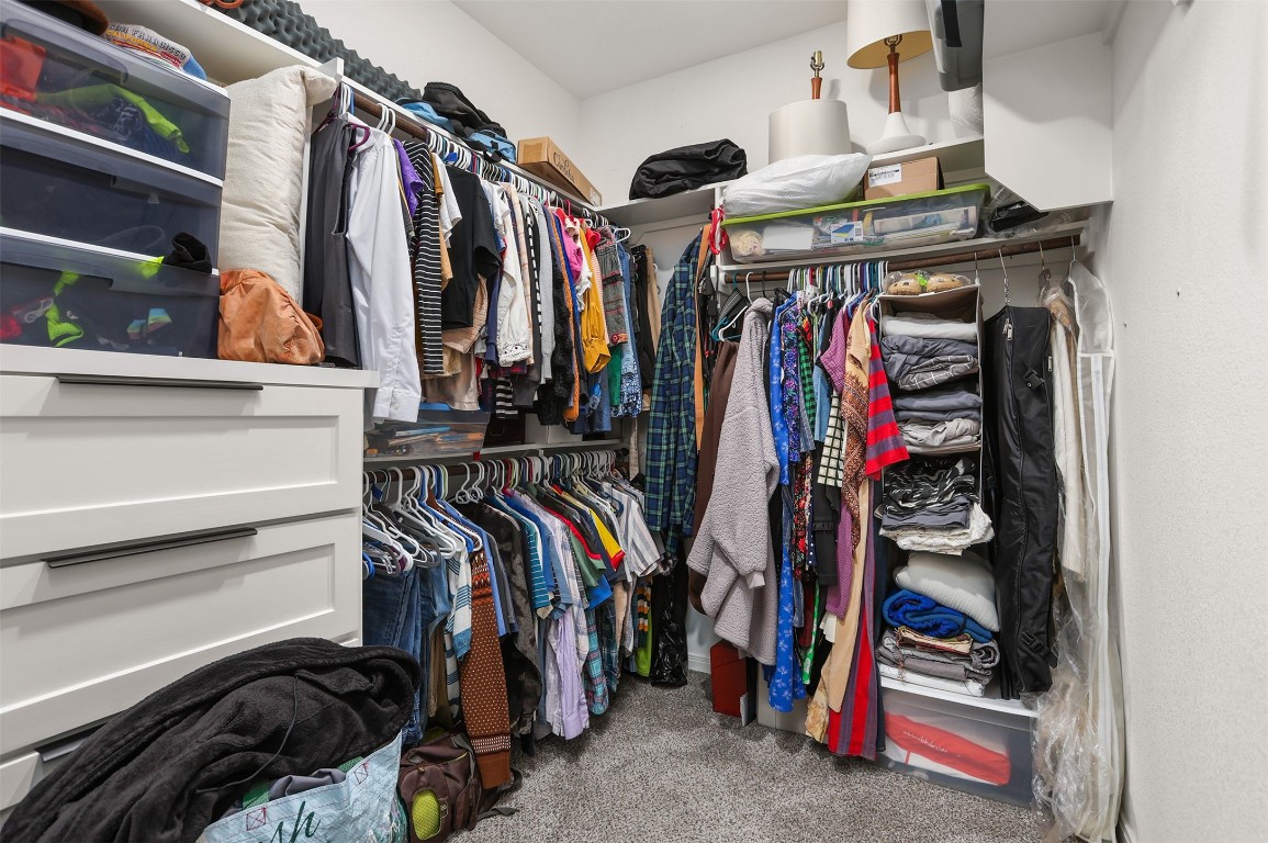 3403 Daisy Santa Fe, TX 77510 - Photo 13 of 25 a view of walk in closet with clothes and shoes