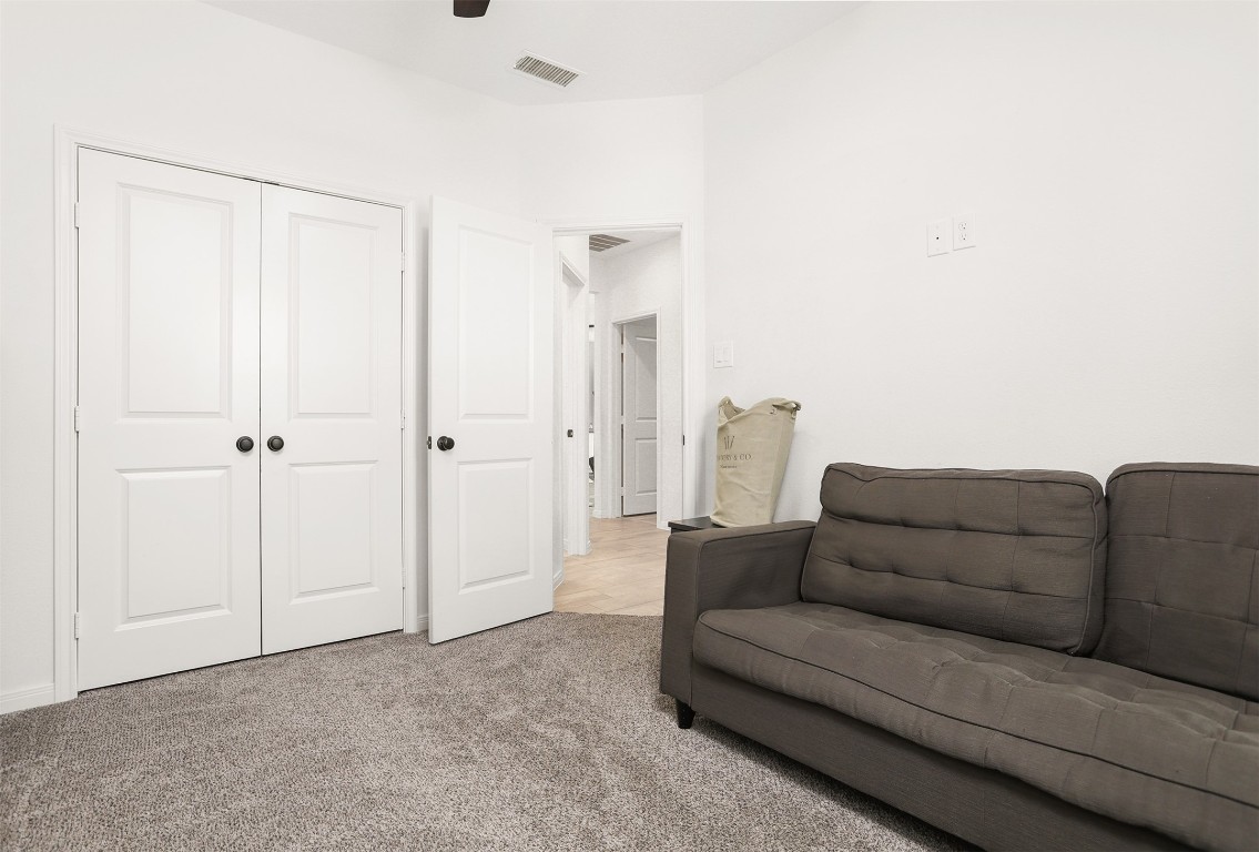 3403 Daisy Santa Fe, TX 77510 - Photo 17 of 25 a living room with furniture and a walk in closet