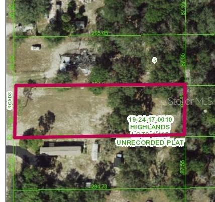 15546 Hicks Road Hudson, FL 34667 - Photo 2 of 8 a view of sign board