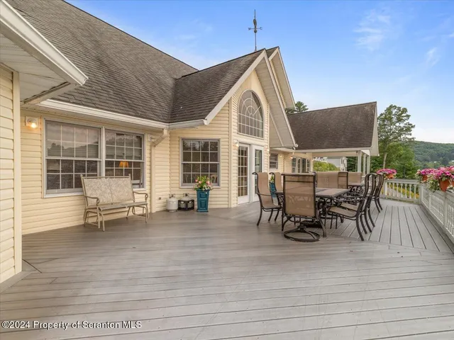 a utility room with sink dryer and washer