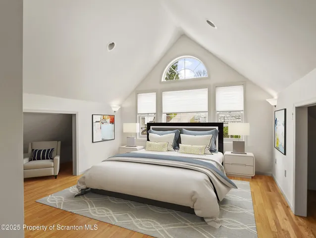an aerial view of house with yard and ocean view