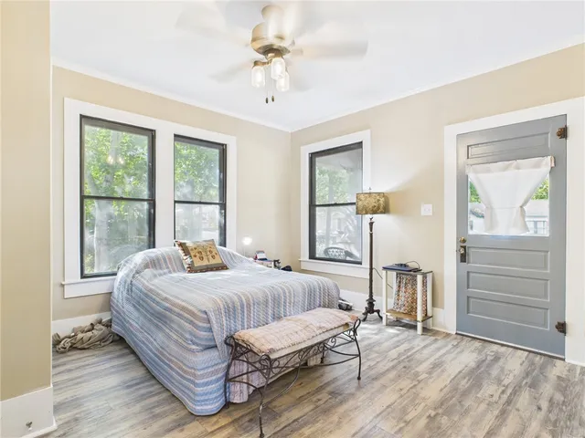a bathroom with a sink mirror and a shower
