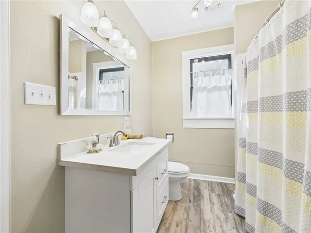 a view of a car parked in front of house