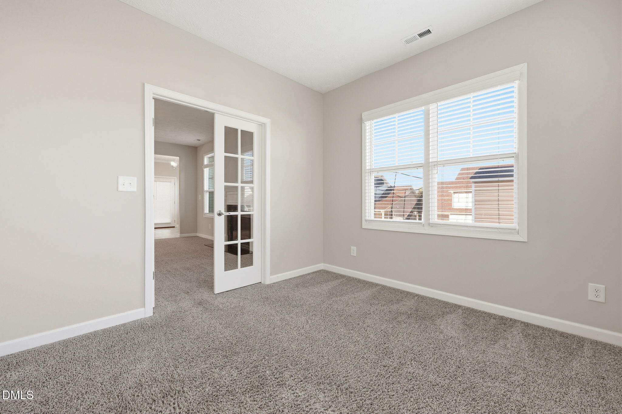 3017 Branscombe Road Fayetteville, NC 28304 - Photo 9 of 43 an empty room with windows