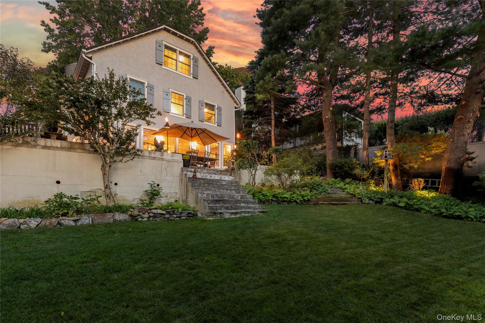46 Hill Street Rye, NY 10580 - Photo 27 of 30 a front view of a house with a garden