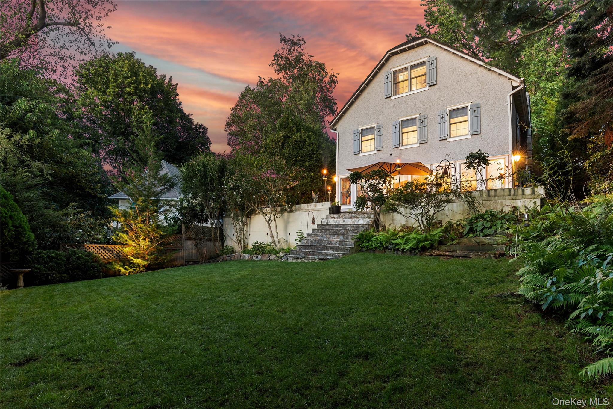 46 Hill Street Rye, NY 10580 - Photo 3 of 30 a front view of house with a garden