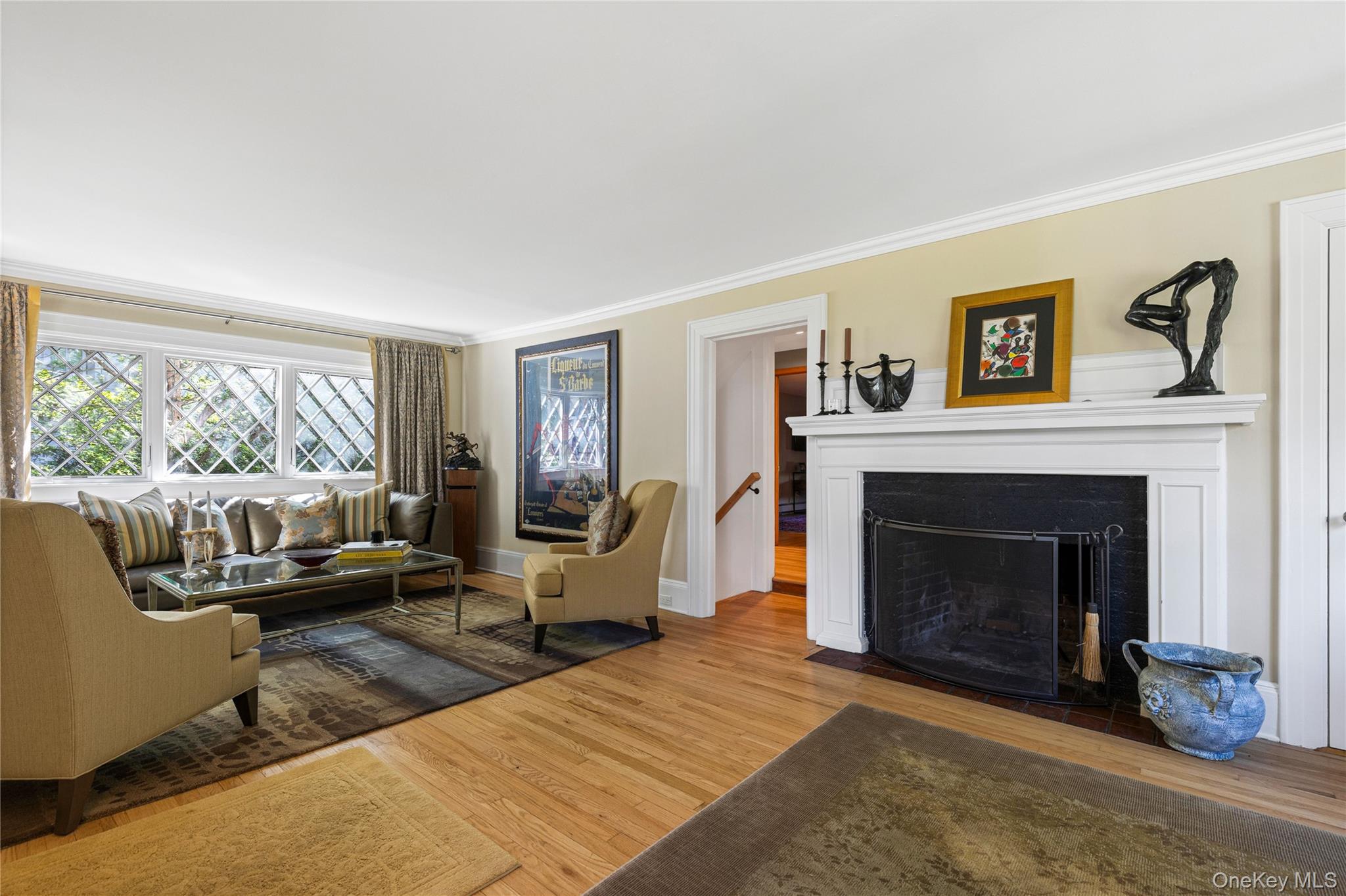 46 Hill Street Rye, NY 10580 - Photo 5 of 30 a living room with furniture and a fireplace