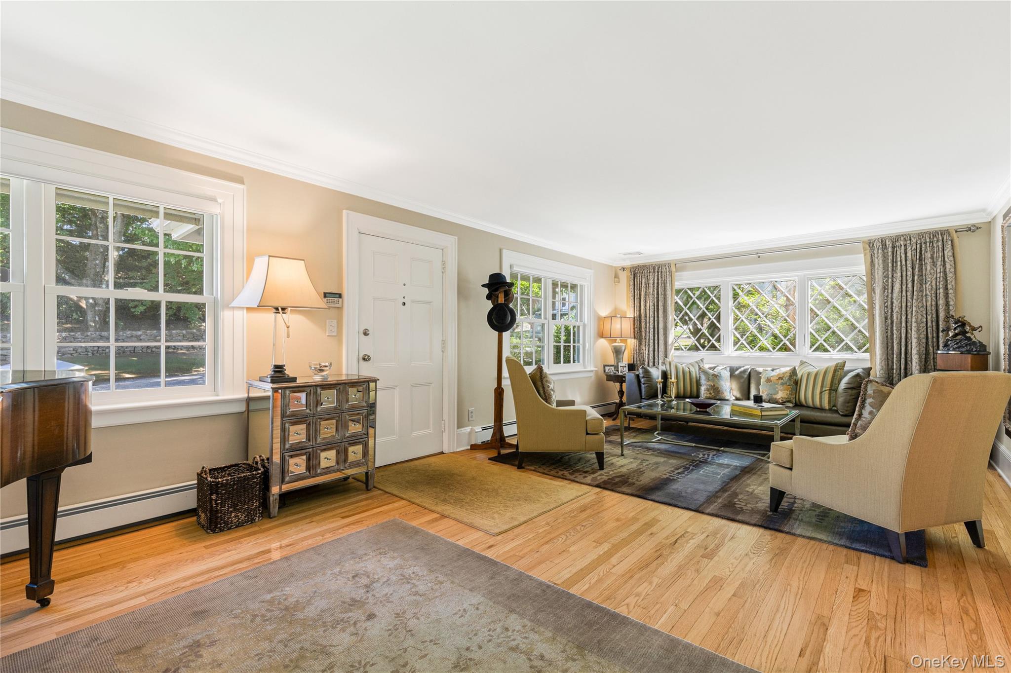 46 Hill Street Rye, NY 10580 - Photo 6 of 30 a living room with furniture and a large window
