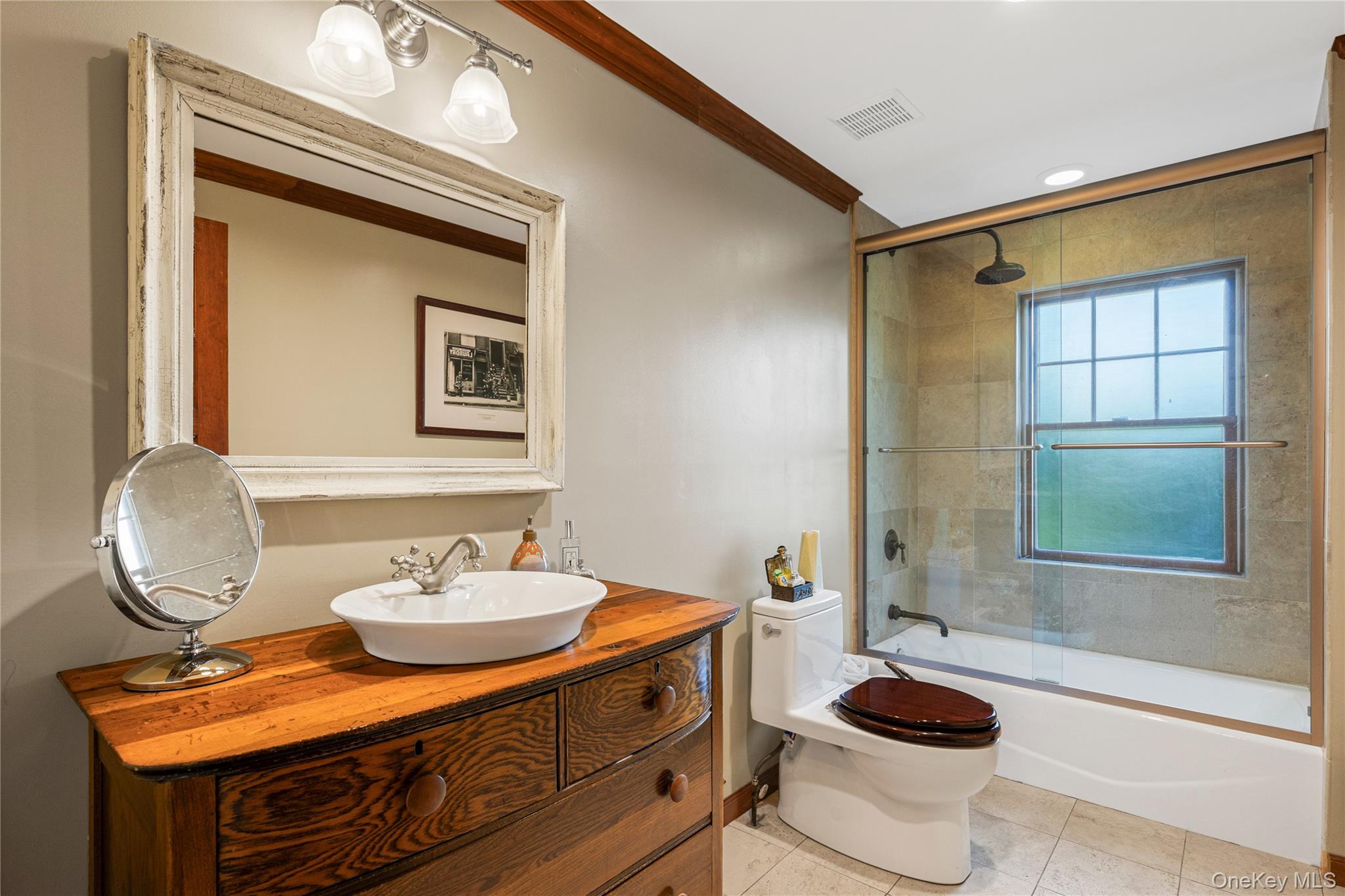 46 Hill Street Rye, NY 10580 - Photo 9 of 30 a bathroom with a sink mirror vanity and toilet