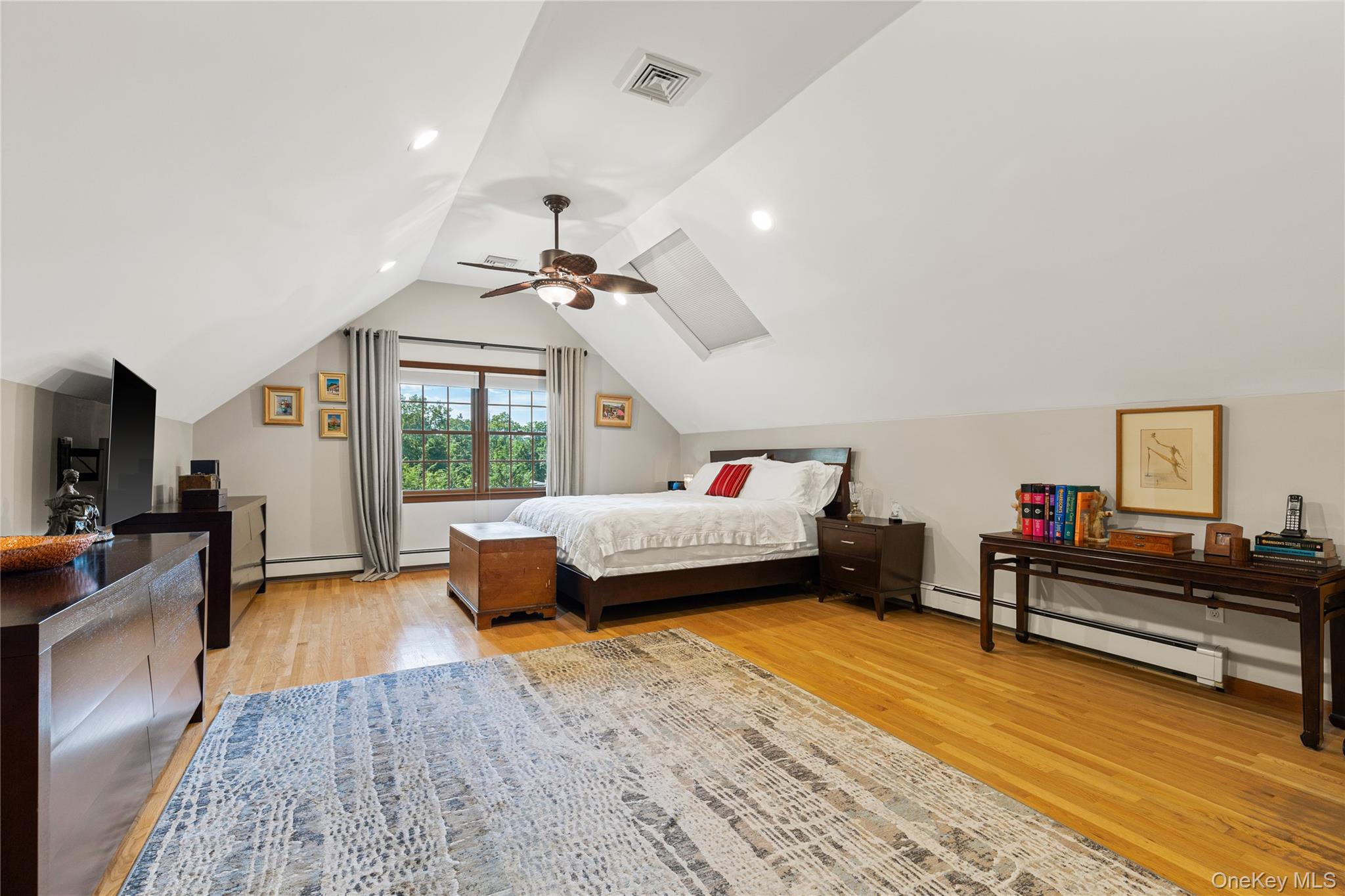 46 Hill Street Rye, NY 10580 - Photo 10 of 30 a bedroom with furniture and a wooden floor