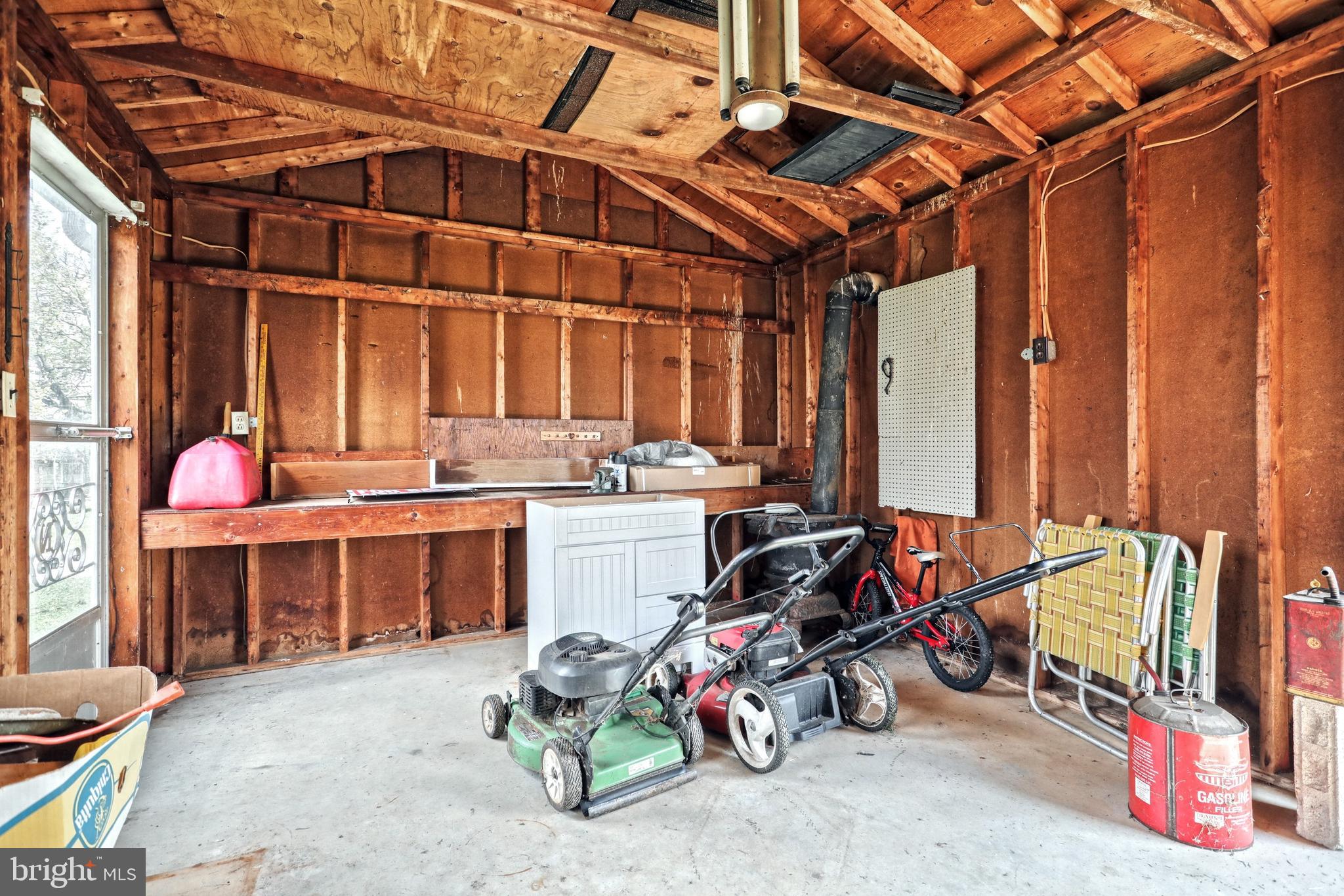 2320 Grandview Road Hanover, PA 17331 - Photo 30 of 31 Workshop with electric and woodstove