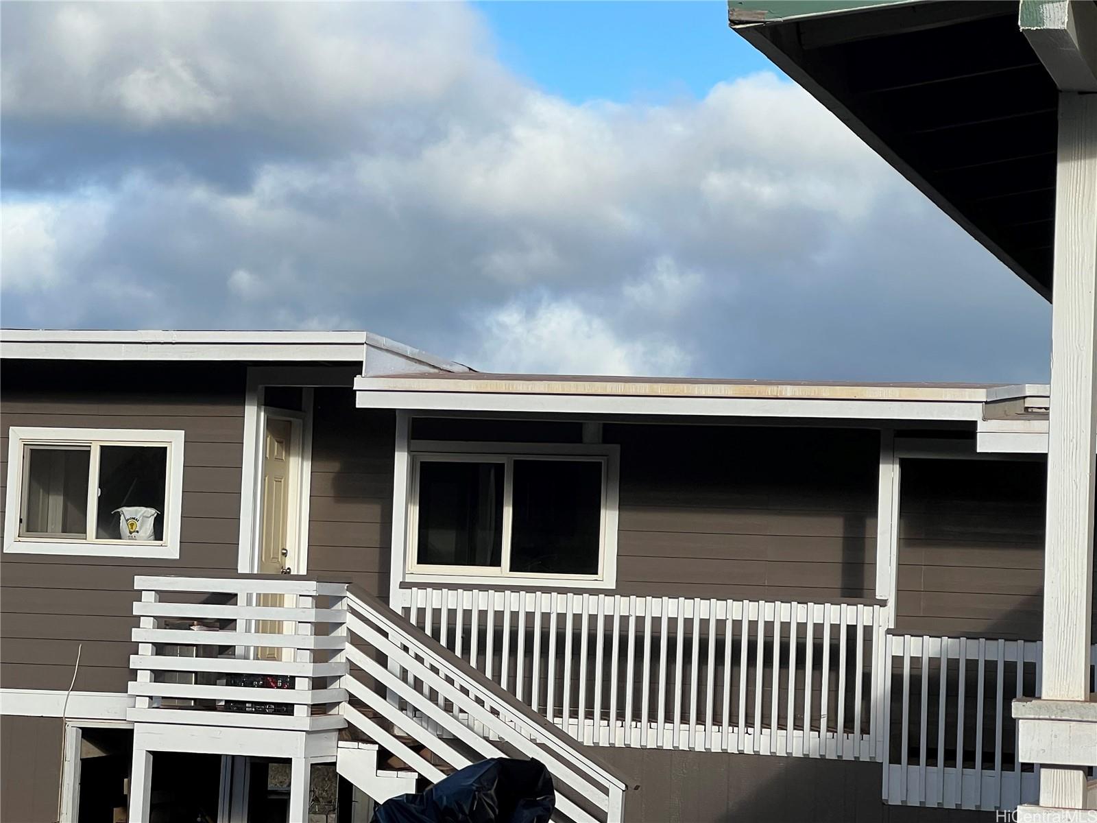 94-1100 Kunia Road, Unit 45 Waipahu, HI 96797 - Photo 5 of 8 a view of a house with a balcony