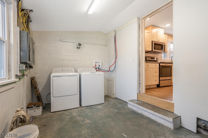 13 Maple Street Milford, NJ 08848 - Photo 16 of 20 a utility room with dryer and washer