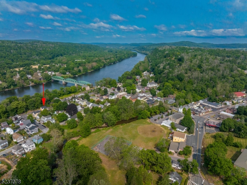 13 Maple Street Milford, NJ 08848 - Photo 17 of 20 a view of a lake with a city