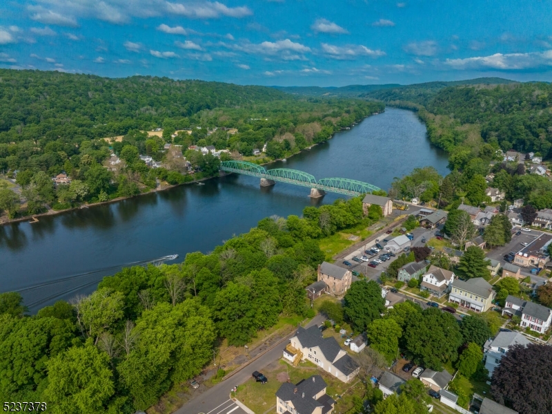 13 Maple Street Milford, NJ 08848 - Photo 2 of 20 an aerial view of residential houses with outdoor space and river
