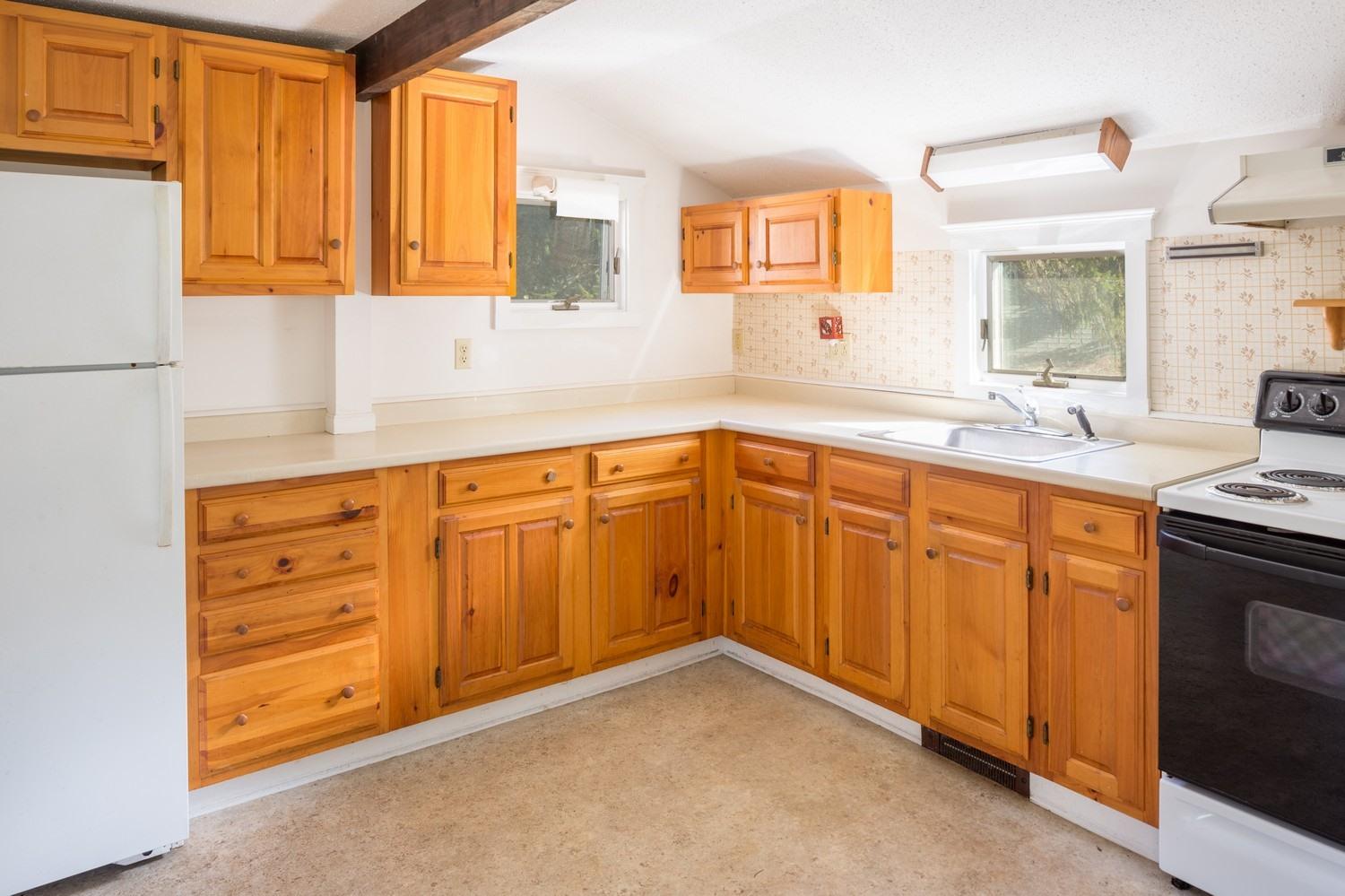 59 South Pamet Road Truro, MA 02666 - Photo 13 of 15 a kitchen with sink cabinets and window