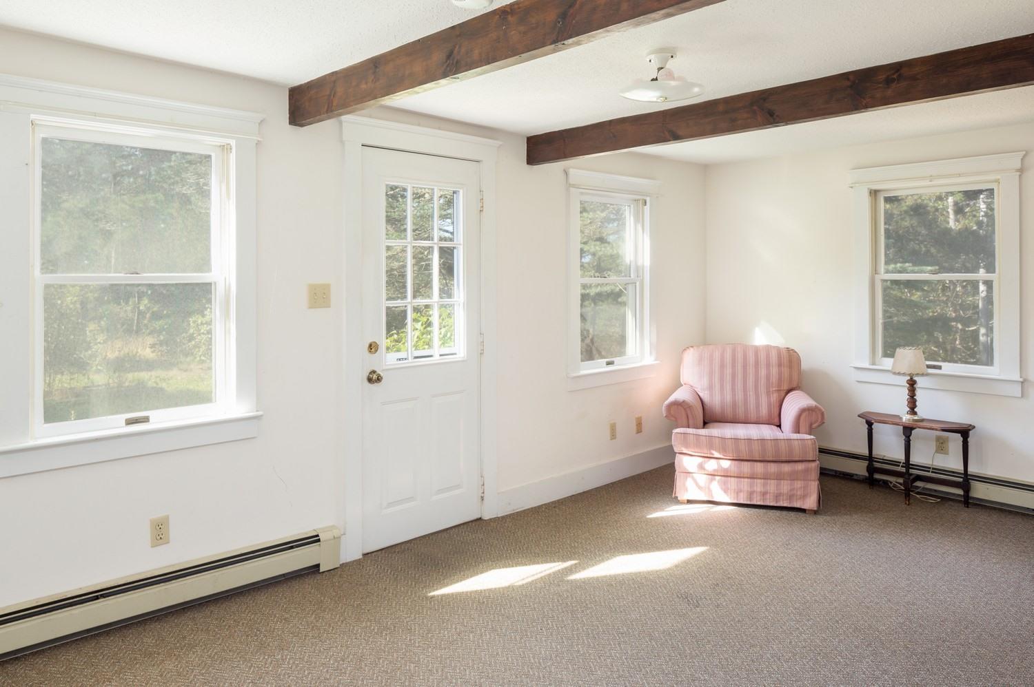 59 South Pamet Road Truro, MA 02666 - Photo 14 of 15 a living room with furniture and a window