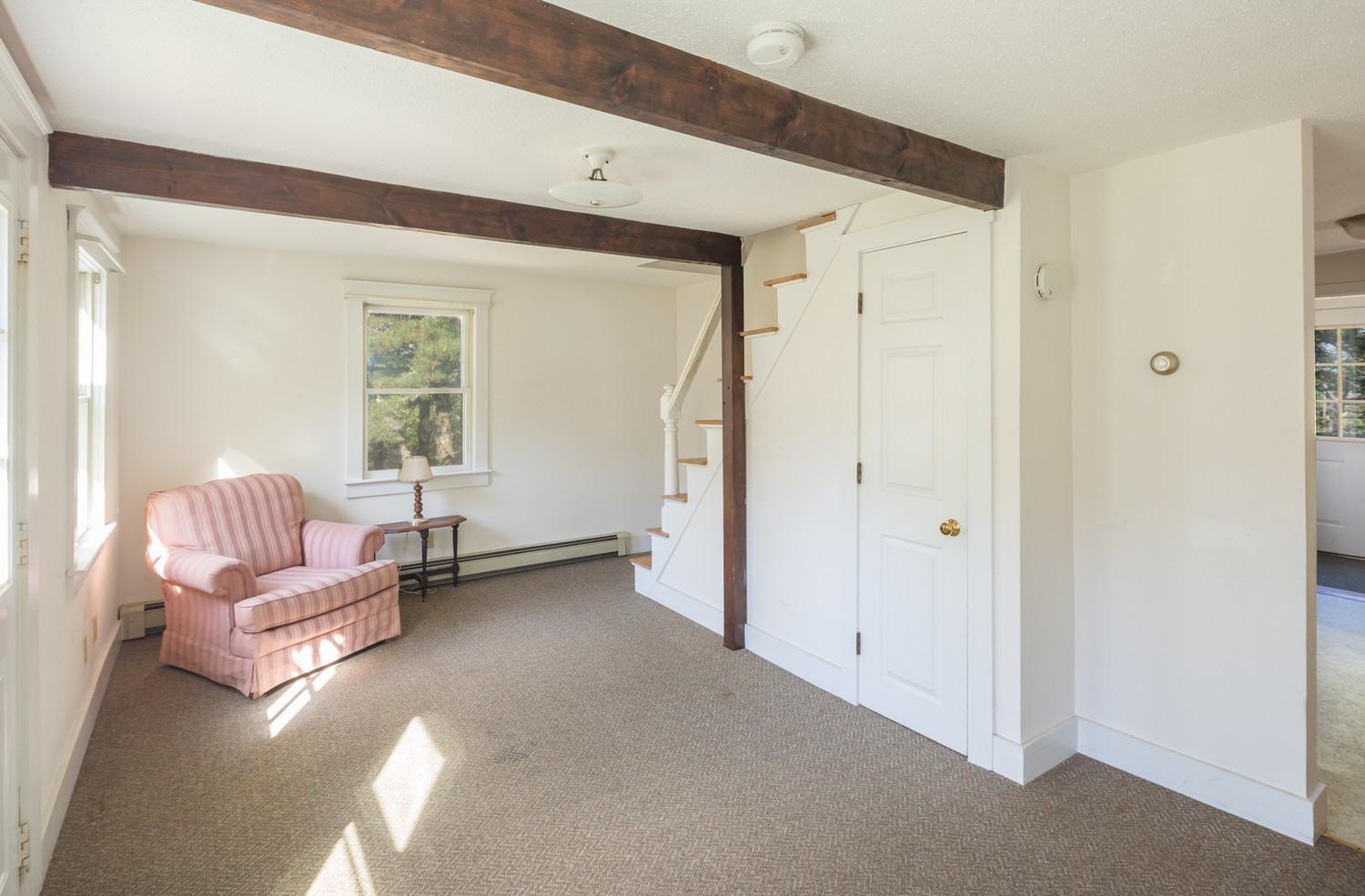 59 South Pamet Road Truro, MA 02666 - Photo 15 of 15 a living room with furniture and a window