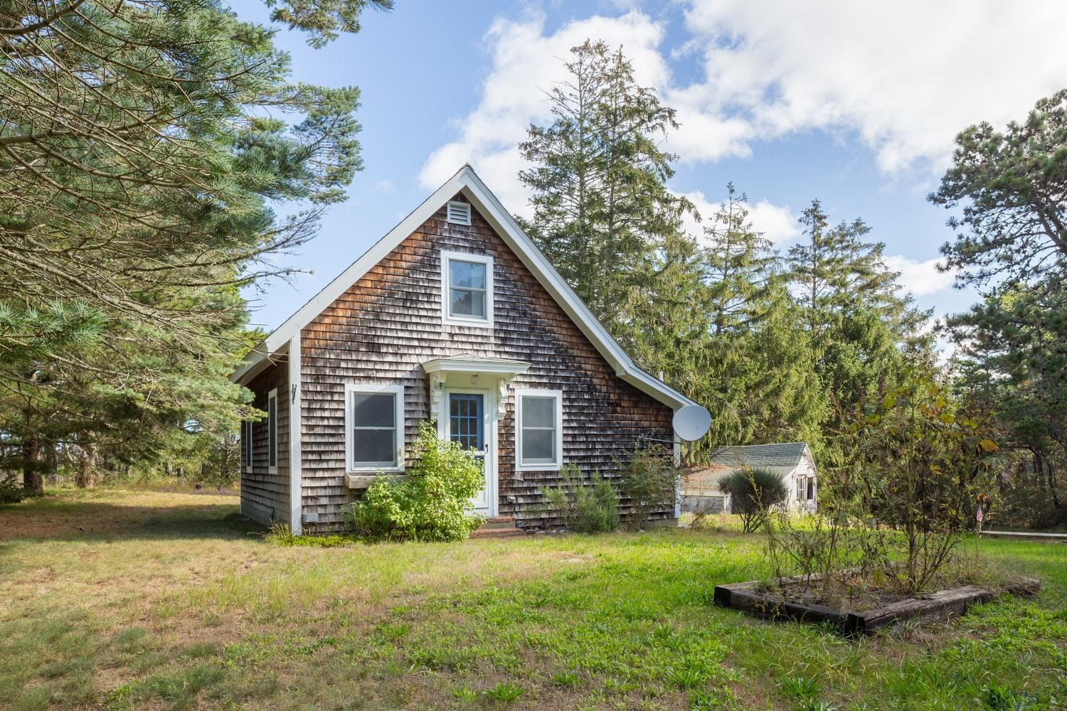59 South Pamet Road Truro, MA 02666 - Photo 2 of 15 a front view of a house with a yard