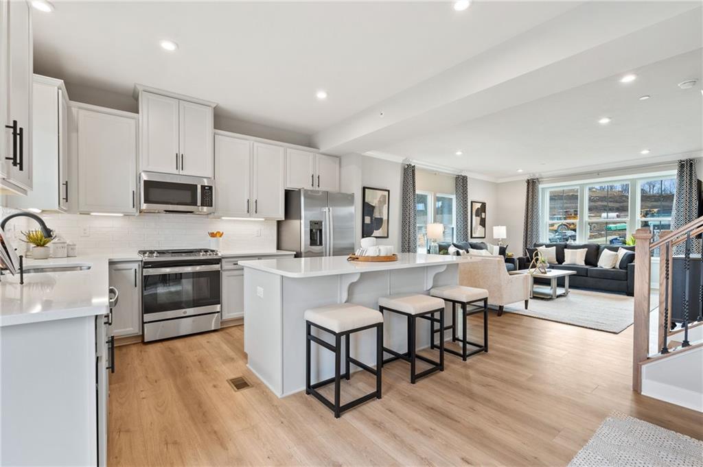 6031 Ruby Way Mars, PA 16046 - Photo 3 of 10 a large kitchen with cabinets