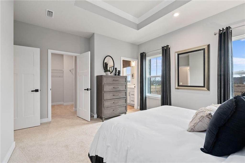 6031 Ruby Way Mars, PA 16046 - Photo 8 of 10 a bedroom with a bed and a dresser