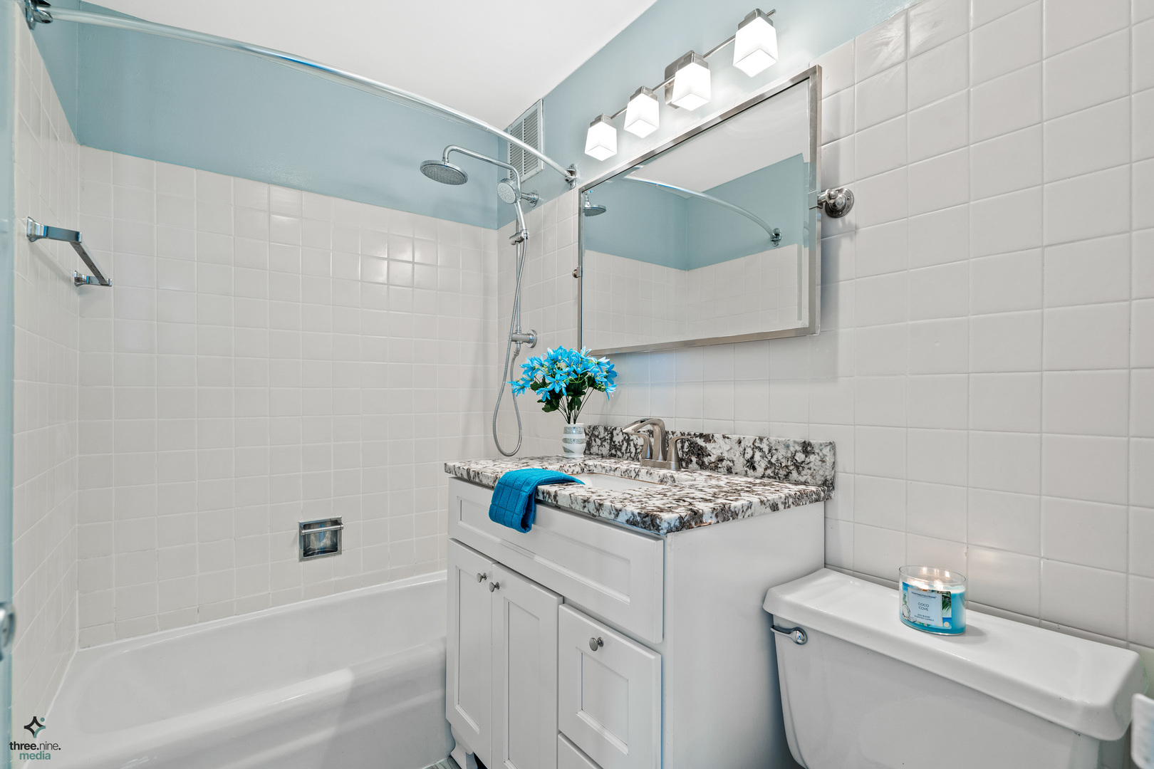 655 West Irving Park Road, Unit 3214 Chicago, IL 60613 - Photo 17 of 37 a bathroom with a sink a toilet and shower