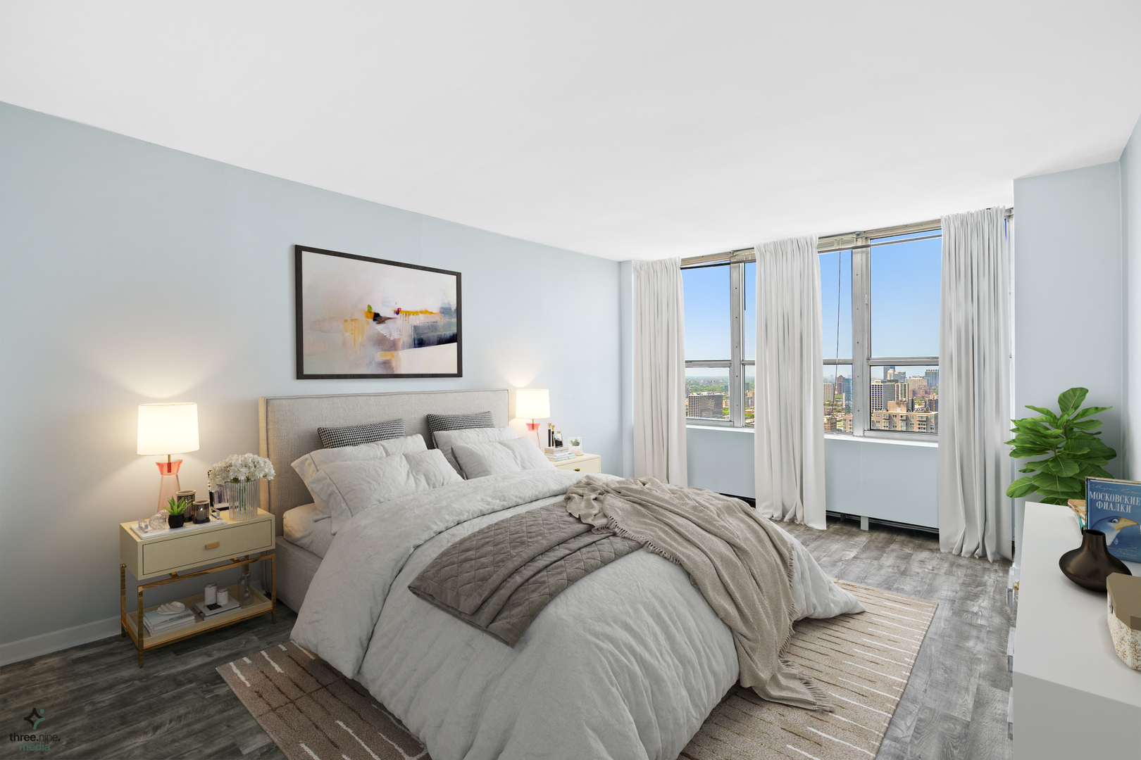 655 West Irving Park Road, Unit 3214 Chicago, IL 60613 - Photo 19 of 37 a bedroom with a bed painting on wall and a potted plant