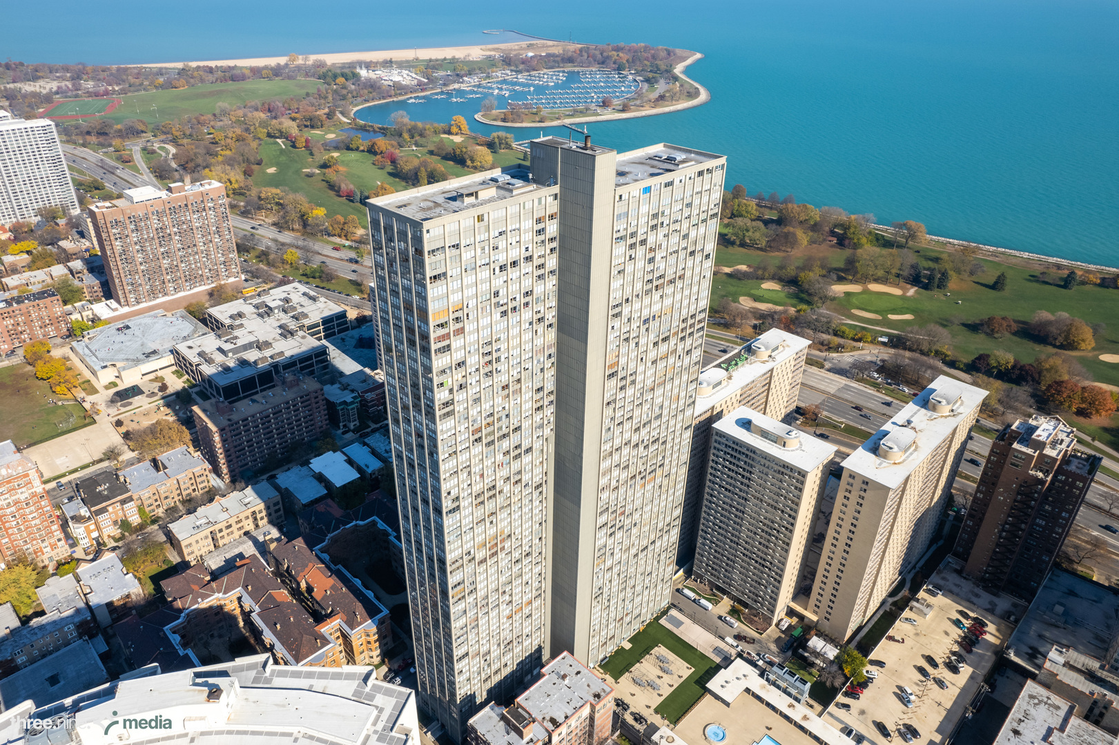 655 West Irving Park Road, Unit 3214 Chicago, IL 60613 - Photo 37 of 37 an aerial view of residential houses with outdoor space