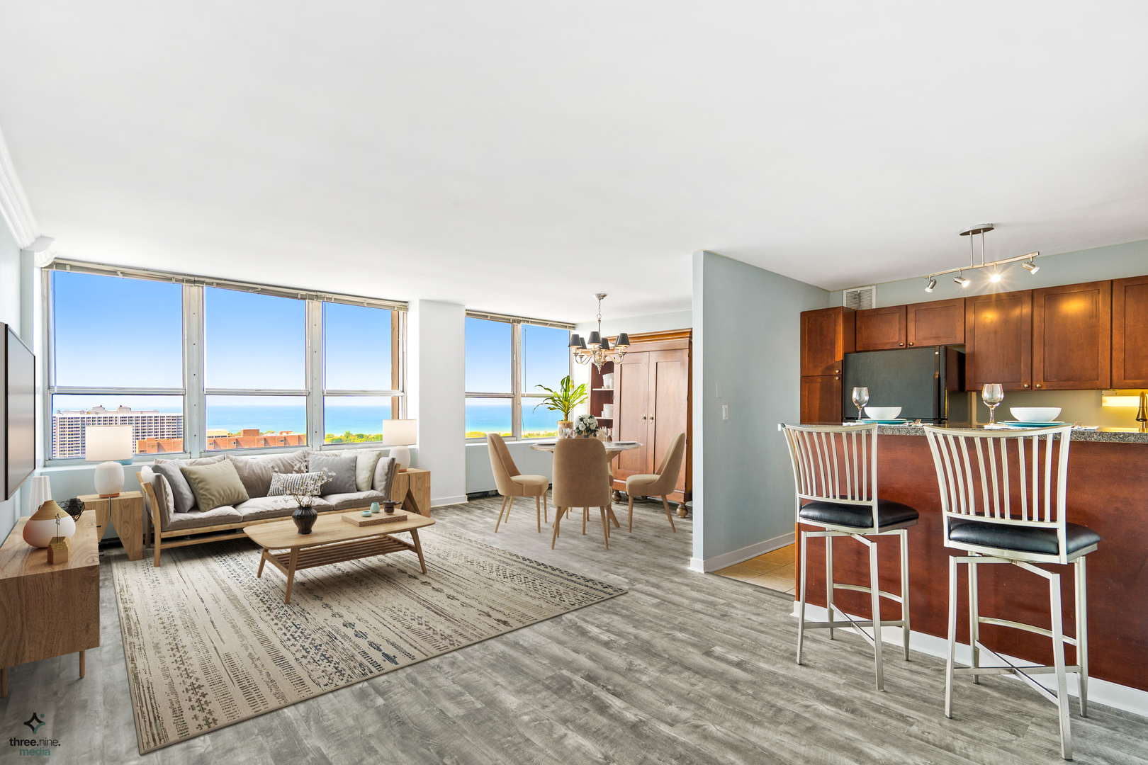 655 West Irving Park Road, Unit 3214 Chicago, IL 60613 - Photo 8 of 37 a living room with furniture and a wooden floor