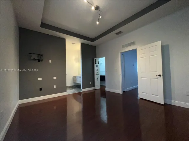 a bathroom with a shower and toilet