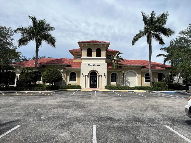 a room with gym equipment and a window