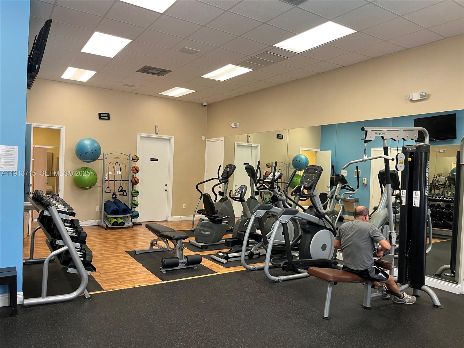 4929 Southwest 140th Terrace, Unit 5 Miramar, FL 33027 - Photo 30 of 42 a view of a room with gym equipment